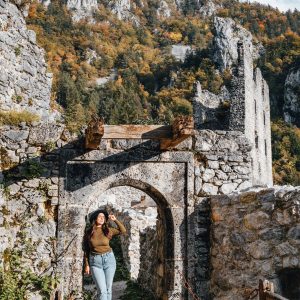 a-vertical-shot-of-the-female-standing-at-the-door-2026-01-11-10-10-35-utc