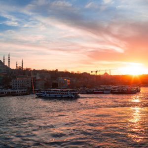 Boats in sea and scenic sunset in Istanbul