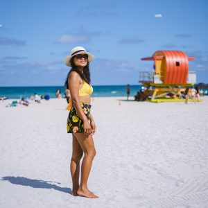 Miami beach, couple on the beach at Miami beach, life guard hut Miami beach Florida