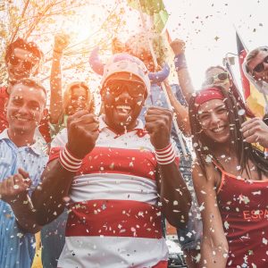 Multinational football supporters celebrating the begin of world