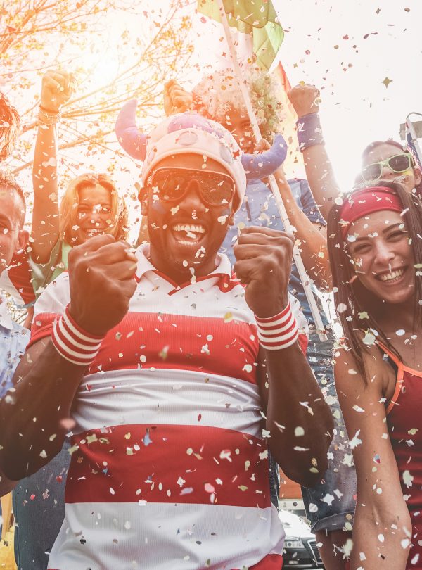 Multinational football supporters celebrating the begin of world