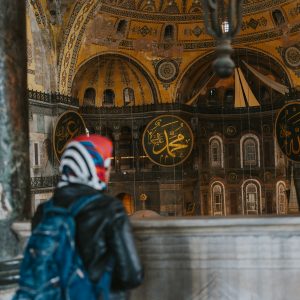 Tourist admiring the interior of hagia sophia in istanbul