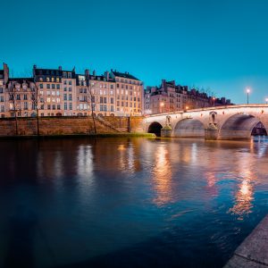 Twilight scene from Paris Seine River with fantastic colors duri