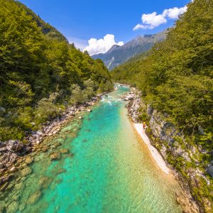 Vivid blue Soca river valley