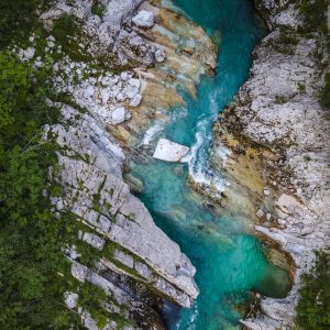 Wild Soca River Valley in Slovenia. Aerial Drone view Top Down.