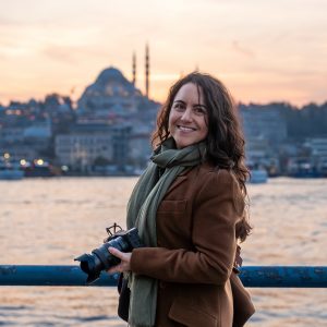 Woman traveling istanbul taking city sunset memories