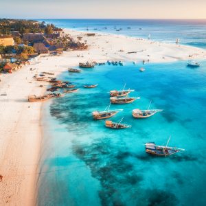 Aerial view of the fishing boats on tropical sea coast