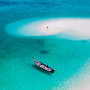 couple of men and women on the beach of Ko Lipe Island Thailand